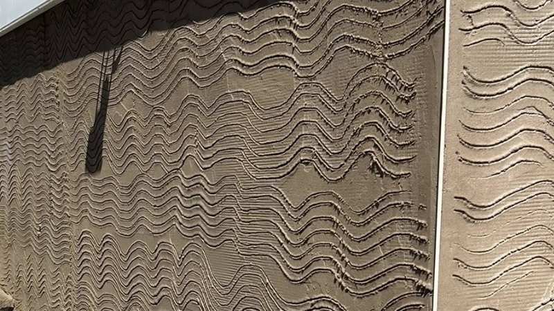 Application of scratch coat render